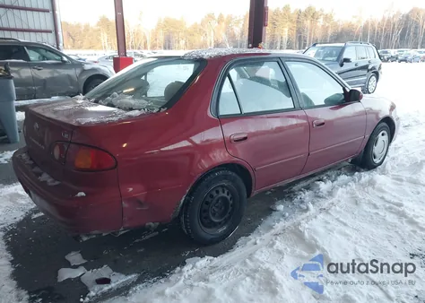2001 Toyota Corolla Le z USA, uszkodzony, nr VIN 2T1BR12E61C491260